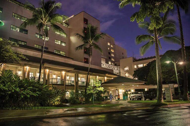 Exterior of the Queen's Medical Center at night