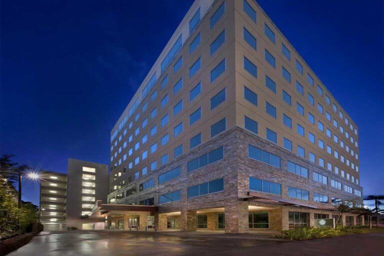 Exterior shot of Hale Pawaa Health Care Center at night