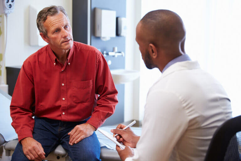 Male patient with an urgent care physician